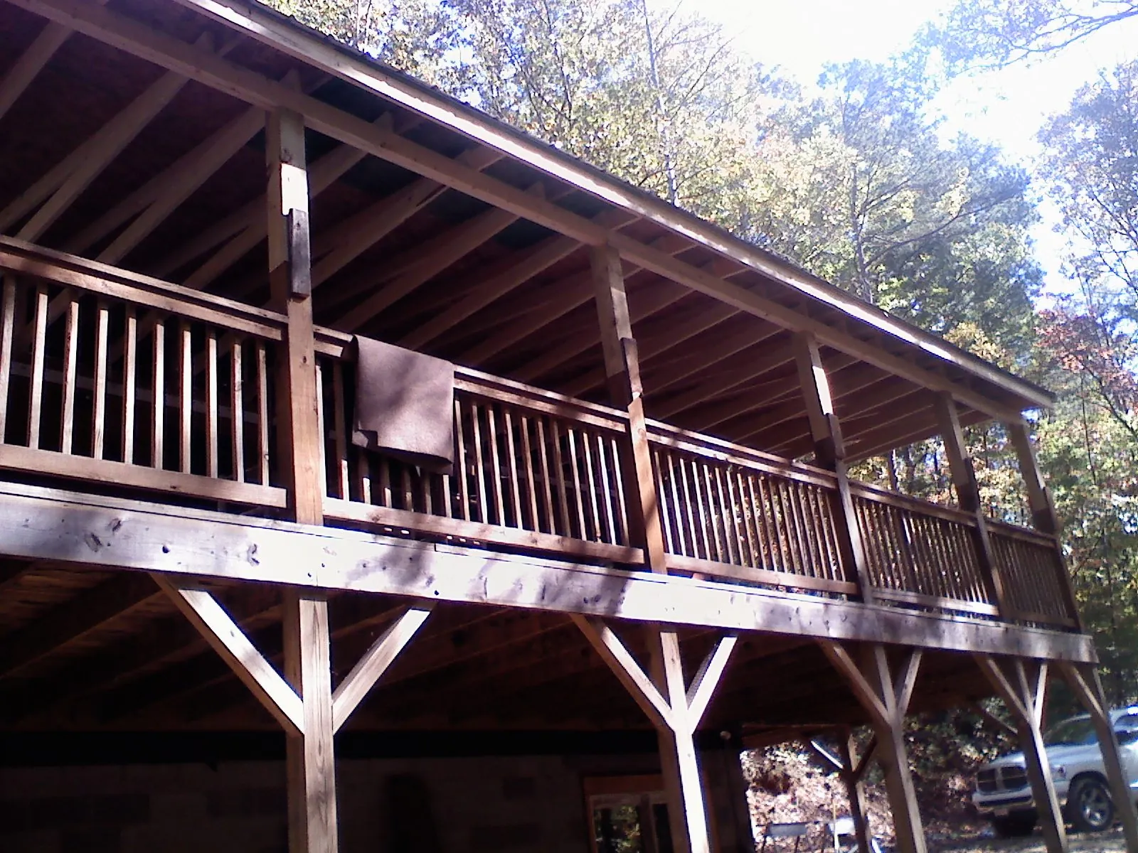 Timber framing under a new elevated porch and deck — Roof Leak Repair in Broad Top by Roofing Brothers